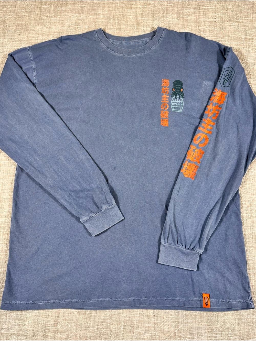 Men's Blue Long-Sleeve Graphic Tee with Orange Accents